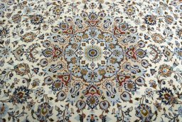 Central medallion detail of 2000s Kashan rug from Iran / Persia