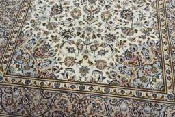 Close-up detail of 2000s Kashan rug from Iran / Persia showing Wool weave