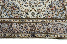 Full view of 2000s Kashan rug from Iran / Persia, 303 × 203 cm in Beige tones