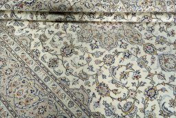 Close-up detail of 2000s Kashan rug from Iran / Persia showing Wool weave