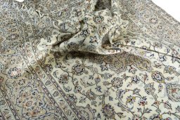 Surface texture of 2000s Kashan rug with natural Wool and intricate pattern
