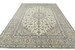 Surface texture of 2000s Kashan rug with natural Wool and intricate pattern