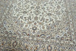 Close-up detail of 2000s Kashan rug from Iran / Persia showing Wool weave