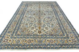 Surface texture of 2000s Kashan rug with natural Wool and intricate pattern