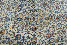 Central medallion detail of 2000s Kashan rug from Iran / Persia