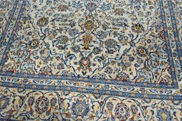 Close-up detail of 2000s Kashan rug from Iran / Persia showing Wool weave