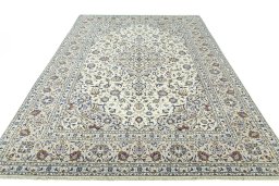 Surface texture of 2000s Kashan rug with natural Wool and intricate pattern