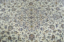 Central medallion detail of 2000s Kashan rug from Iran / Persia