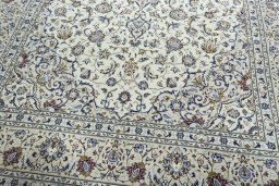 Close-up detail of 2000s Kashan rug from Iran / Persia showing Wool weave
