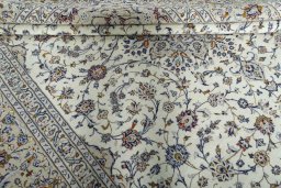 Close-up detail of 2000s Kashan rug from Iran / Persia showing Wool weave