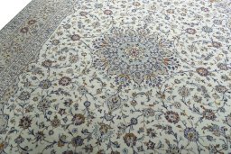 Backside of handmade 2000s Kashan rug showing knot structure and weave density