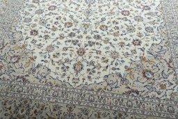 Close-up detail of 2000s Kashan rug from Iran / Persia showing Wool weave