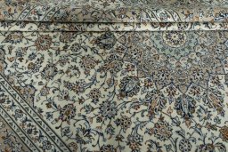 Close-up detail of 2000s Kashan rug from Iran / Persia showing Wool weave