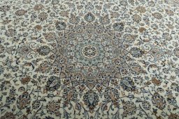 Central medallion detail of 2000s Kashan rug from Iran / Persia