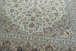 Close-up detail of 2000s Kashan rug from Iran / Persia showing Wool weave