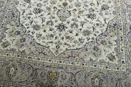Close-up detail of 2000s Kashan rug from Iran / Persia showing Wool weave