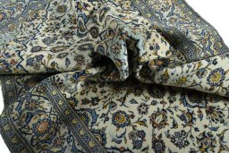 Surface texture of 2000s Kashan rug with natural Wool and intricate pattern