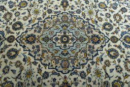 Central medallion detail of 2000s Kashan rug from Iran / Persia