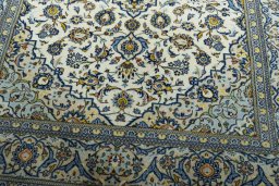 Close-up detail of 2000s Kashan rug from Iran / Persia showing Wool weave