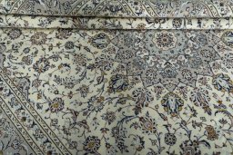 Close-up detail of 2000s Kashan rug from Iran / Persia showing Wool weave