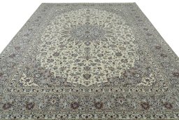 Surface texture of 2000s Kashan rug with natural Wool and intricate pattern