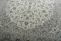 Close-up detail of 2000s Kashan rug from Iran / Persia showing Wool weave