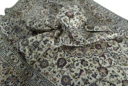 Surface texture of 2000s Kashan rug with natural Wool and intricate pattern