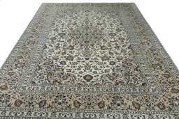 Surface texture of 2000s Kashan rug with natural Wool and intricate pattern