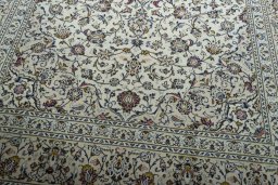 Close-up detail of 2000s Kashan rug from Iran / Persia showing Wool weave