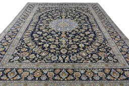 Surface texture of 2000s Kashan rug with natural Wool and intricate pattern