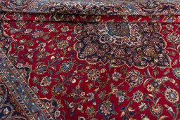 Close-up detail of 2000s Kashan rug from Iran / Persia showing Wool weave