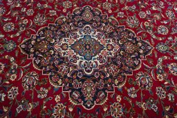 Central medallion detail of 2000s Kashan rug from Iran / Persia
