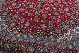 Close-up detail of 2000s Kashan rug from Iran / Persia showing Wool weave