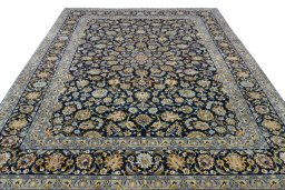 Surface texture of 2000s Kashan rug with natural Wool and intricate pattern