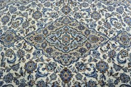 Central medallion detail of 2000s Kashan rug from Iran / Persia