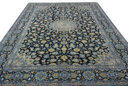 Surface texture of 2000s Kashan rug with natural Wool and intricate pattern