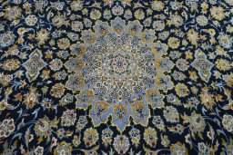 Central medallion detail of 2000s Kashan rug from Iran / Persia