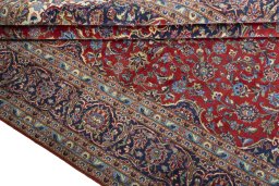 Close-up detail of 2000s Kashan rug from Iran / Persia showing Cork weave