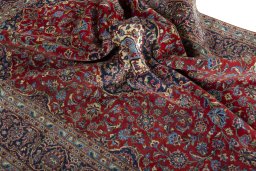Surface texture of 2000s Kashan rug with natural Cork and intricate pattern