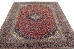 Surface texture of 2000s Kashan rug with natural Cork and intricate pattern