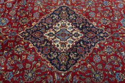 Central medallion detail of 2000s Kashan rug from Iran / Persia