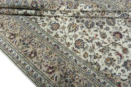 Close-up detail of 2000s Kashan rug from Iran / Persia showing Wool weave