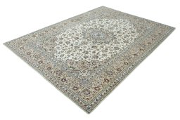 Corner detail of 2000s Kashan rug showing border pattern and Wool pile