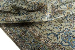 Surface texture of 2000s Kashan rug with natural Wool and intricate pattern