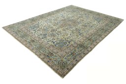 Corner detail of 2000s Kashan rug showing border pattern and Wool pile