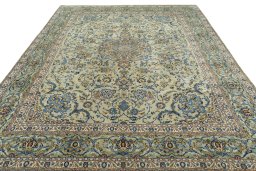 Surface texture of 2000s Kashan rug with natural Wool and intricate pattern