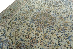 Backside of handmade 2000s Kashan rug showing knot structure and weave density