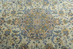 Central medallion detail of 2000s Kashan rug from Iran / Persia