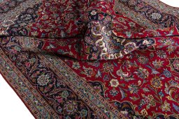 Surface texture of 2000s Kashan rug with natural Wool and intricate pattern