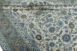 Close-up detail of 2000s Kashan rug from Iran / Persia showing Wool weave